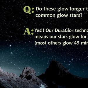 May include: A night sky with stars and mountains in the foreground. Text on the image reads: "Q: Do these glow longer than common glow stars? A: Yes!! Our DuraGlo&reg; technology means our stars glow for 10hrs! (most others glow 45 min+/-) "