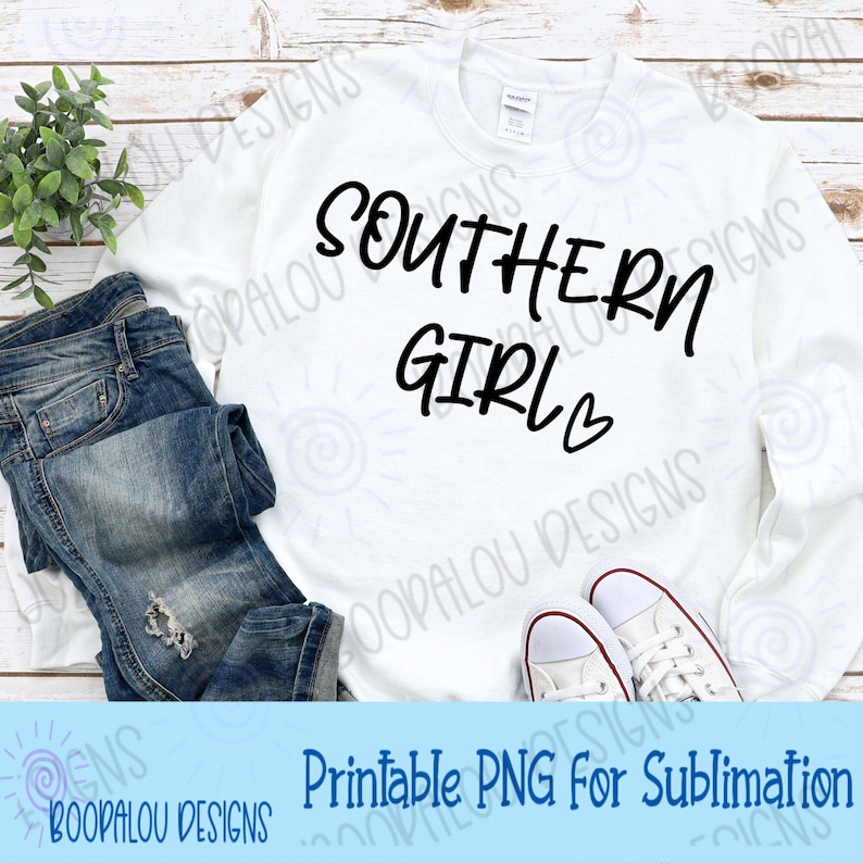 May include: White long-sleeved sweatshirt with the text "SOUTHERN GIRL" in black script with a small heart.