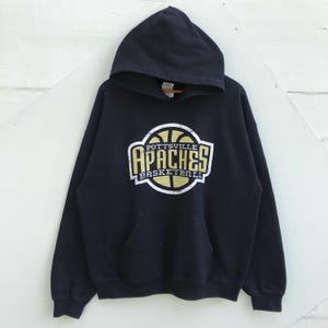 May include: Black hooded sweatshirt with a large gold and white graphic of a basketball with the text "Pottsville Apaches Basketball".