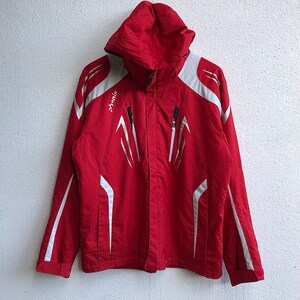 Puede incluir: Chaqueta de esquí roja con detalles blancos y la palabra "phenix" en el lado izquierdo del pecho.