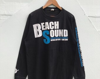 Großes, Vintage Beach Sound Surf Shirt, schwarzes Langarm-Ozean-Grafik-T-Shirt, Surfer Ästhetischer Surf-Rundhalsausschnitt, Küsten-Streetwear