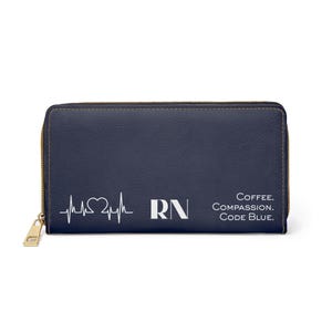 May include: Navy blue wallet with a gold zipper. The wallet features a white heartbeat line with a heart, the letters "RN", and the words "Coffee. Compassion. Code Blue."