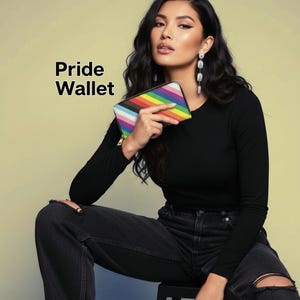 May include: A set of three ceramic mugs with a speckled, matte finish. The mugs are in shades of cream, light gray, and dark gray. Each mug has a simple, modern design and a rounded handle.