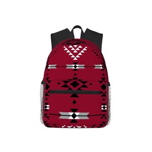 May include: A burgundy backpack with a geometric pattern in black, white, and gray. The backpack has a black top handle and shoulder straps, with mesh side pockets and a front zipper pocket.