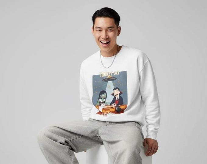 Thanksgiving 2025 Crewneck – Zombie Woman & Vampire Guy at Dinner with Pets Under UFO | Turkey Day Horror Graphic Sweatshirt