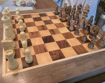 Custom walnut and maple chess board with chess and checker pieces
