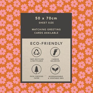May include: A brown and pink floral pattern background with a white rectangle in the centre. The rectangle has the text "50 x 70cm SHEET SIZE MATCHING GREETING CARDS AVAILABLE ECO-FRIENDLY" and four icons representing 100% recycled and recyclable, carbon balanced, FSC certified paper, and biodegradable and vegetable inks.