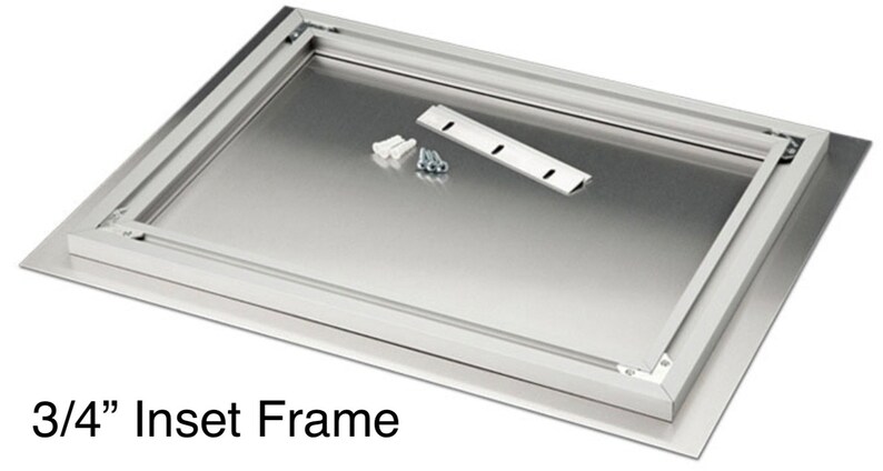 May include: A 3/4" inset frame kit, featuring a silver metal frame and backing. The kit includes mounting hardware: screws, wall anchors, and a metal bracket. The frame is designed for a flush, recessed installation.