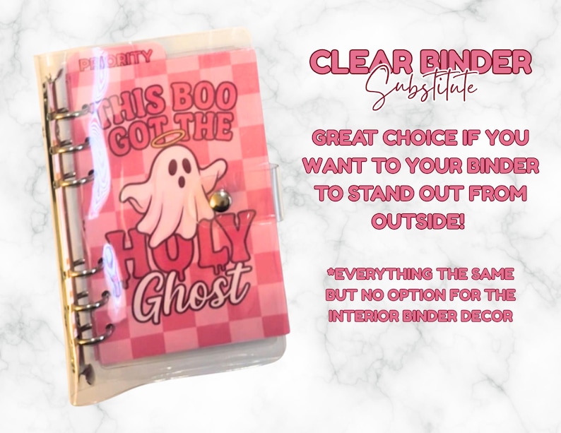 May include: A clear binder with a pink cover featuring a ghost illustration and the text "THIS BOO GOT THE HOLY Ghost". The binder has a silver metal ring mechanism and a snap closure.