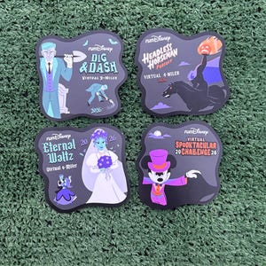 May include: Four rectangular runDisney event magnets with rounded edges. The magnets feature themed graphics: Dig & Dash Virtual 3-Miler, Headless Horseman Pursuit Virtual 4-Miler 2026, Eternal Waltz Virtual 6-Miler 2026, and Virtual Spooktacular 2026 Challenge.