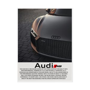 May include: A close-up of a black Audi R8 sports car. The image highlights the front grille, headlights, and the Audi logo. The text at the bottom describes the car's performance and features.