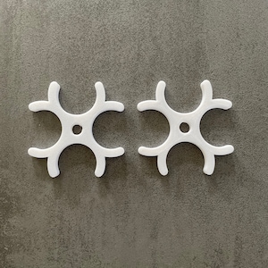 2 IKEA Antilop high chair clips for the chair legs