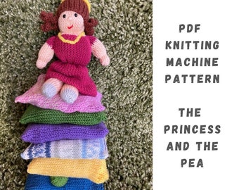 May include: A knitted doll of a princess sitting on a stack of colorful knitted pillows. The doll has brown hair, a yellow crown, and a pink dress. The pillows are pink, green, purple, blue, and yellow. The text "PDF KNITTING MACHINE PATTERN THE PRINCESS AND THE PEA" is visible in the image.