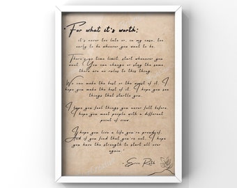 May include: A framed wall art print featuring the text For what it's worth: it's never too late or, in my case, too early to be whoever you want to be. The text is printed in black script on a tan, parchment-style background inside a white frame.