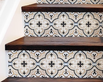 May include: A set of four decorative stair treads with a beige, black, and white geometric pattern. The treads are made of a durable material and are easy to install.