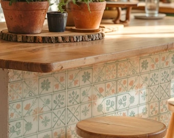 Piastrelle decorative con motivo a spina di pesce color salvia, autoadesive, ideali per rivestire la parete dietro la cucina o il bagno.