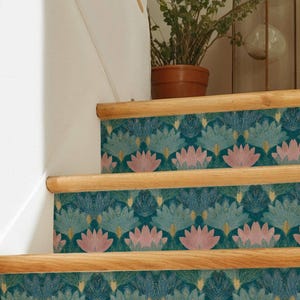 May include: Staircase with decorative risers. The teal background features a repeating floral pattern in pink, blue, and gold. The wooden steps and risers create a cohesive design element.