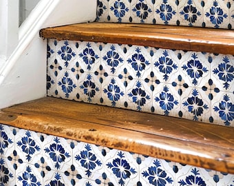 May include: A set of blue and white patterned tile stickers for stairs. The stickers are applied to the wooden steps, creating a decorative and stylish look.