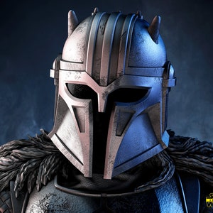 May include: A close-up of a silver and blue Mandalorian helmet with horns. The helmet has a weathered look and is made of metal. The helmet is from the Star Wars universe.
