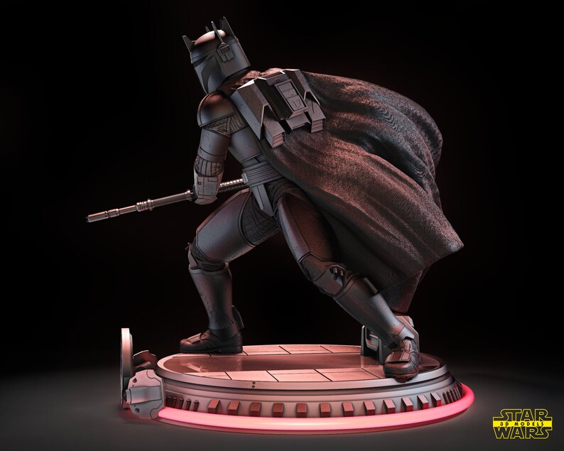 May include: A black and silver Star Wars action figure of a Mandalorian with a cape, holding a weapon, standing on a circular base with a red light.