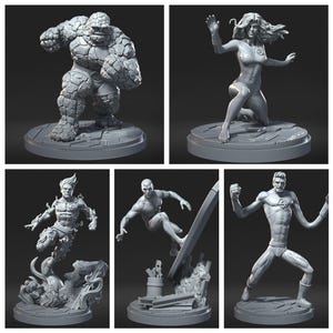 May include: A collection of five gray superhero figurines. The Thing stands in a powerful pose, while the Invisible Woman kneels. The Human Torch is depicted with flames, and the Silver Surfer surfs. Mr. Fantastic is also shown.