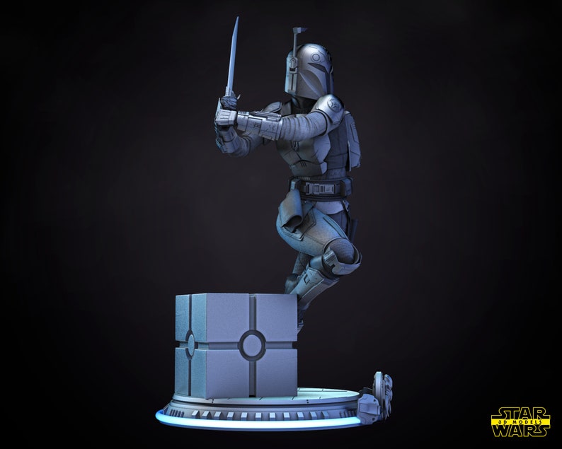 以下が含まれることがあります： 青いグレーのスターウォーズのアクションフィギュアは、ライトセーバーを持ったマンダロリアンで、青い光輪のある灰色の立方体のベースの上に立っています。