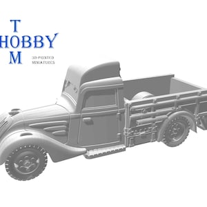 Könnte beinhalten: Ein grauer, 3D-gedruckter Miniatur-LKW mit detailliertem Design. Der LKW hat einen klassischen Frontlenker-Stil, eine Ladefläche und realistische Räder. Der Text "T HOBBY M 3D-PRINTED MINIATURES" ist in Blau zu sehen.