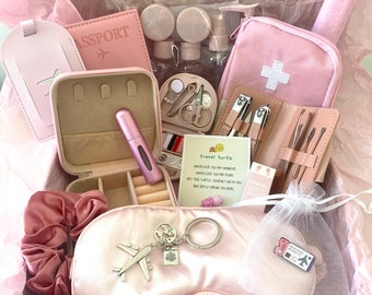 Travel essentials kit. pink holiday minis gift box. Travel hamper postal box. Pretty travel gift set for backpackers.