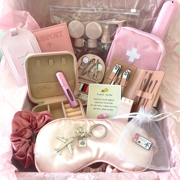 Travel essentials kit. pink holiday minis gift box. Travel hamper postal box. Pretty travel gift set for backpackers.