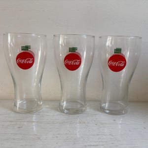 Set of three Coca Cola glasses
