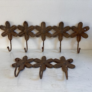 Cast iron racks/coat racks, flowers, vintage