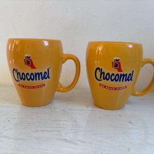 Set of two Chocomel mugs, Nutricia, the one and only, logo on one side, handle on the right