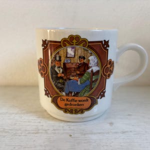 Mug by Douwe Egberts mug, Villeroy & Boch, 1970, the coffee is drunk