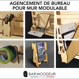 Peut inclure: Ensemble de six rangements muraux en bois pour un système mural modulable. Les rangements comprennent un porte-crayons, un support de téléphone, un distributeur de ruban adhésif, un porte-revues, une étagère et un porte-dossiers. Les rangements sont en bois clair et ont une finition naturelle.
