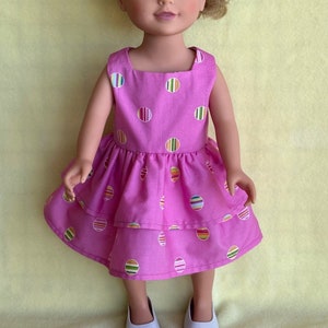 Bubble Gum Dress of pink cotton with colored bubble design, tiered skirt, and matching scarf