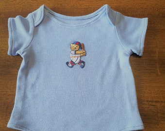 Baby one-piece bodysuit (onsie) made of soft stretchy cotton knit with snap tape crotch. Size 0-3 mos.