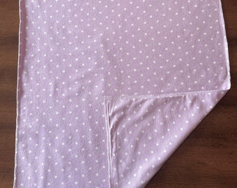 Receiving blankets are hand made of cotton flannel to keep baby warm. Each two layer blanket has decorative stitching on each edge.