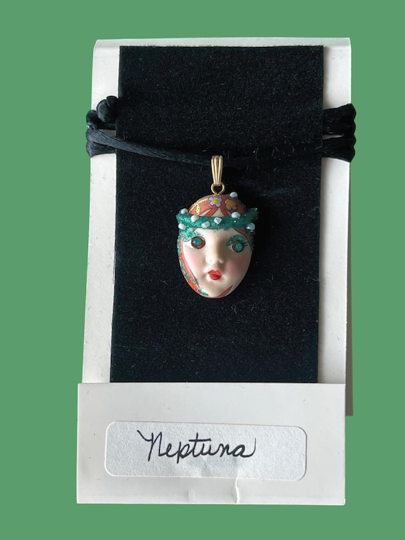 NEPTUNA, sea-born and story-filled. Redheaded mermaid face pendant necklace by ADAGIO© with floral crown, oceanic sparkle & 1980s charm. New