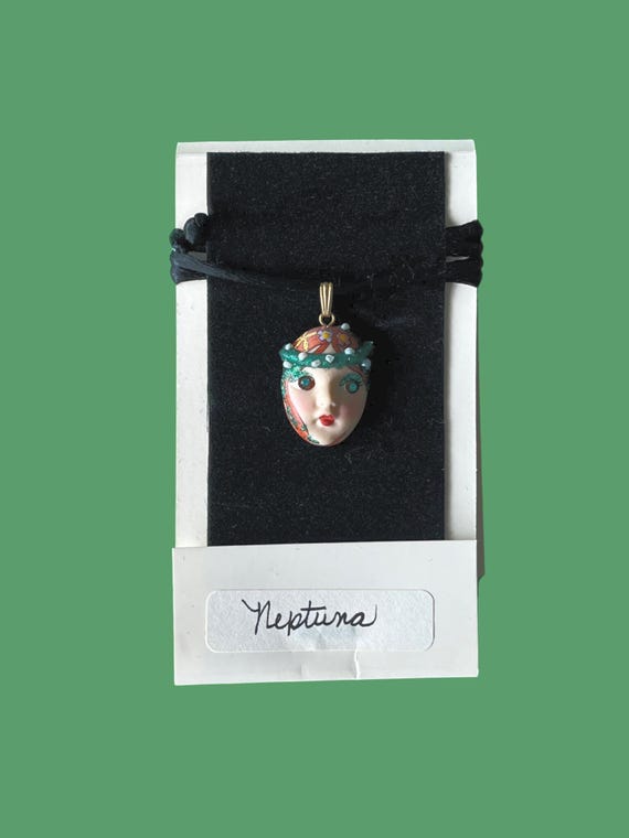 NEPTUNA, sea-born and story-filled. Redheaded mermaid face pendant necklace by ADAGIO© with floral crown, oceanic sparkle & 1980s charm. New View 6
