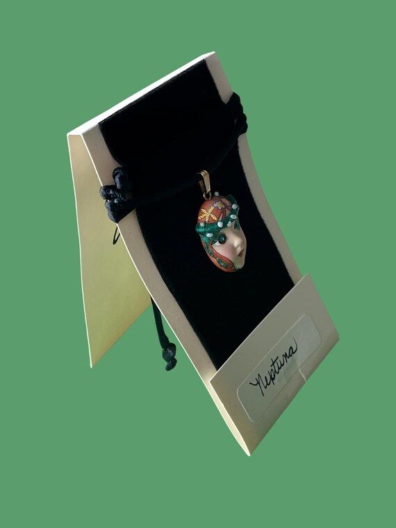 NEPTUNA, sea-born and story-filled. Redheaded mermaid face pendant necklace by ADAGIO© with floral crown, oceanic sparkle & 1980s charm. New View 2