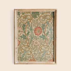 May include: A framed print with a floral pattern in shades of green, pink, and white. The flowers are stylized and have a vintage aesthetic.