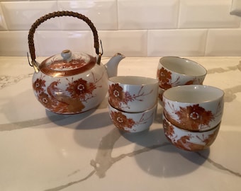 Tetera japonesa vintage Kutani con diseño de pavo real y peonías, con juego de seis tazas para té/sake.