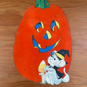 Vintage flocked paper die cut Halloween smiling pumpkin with little witch mouse