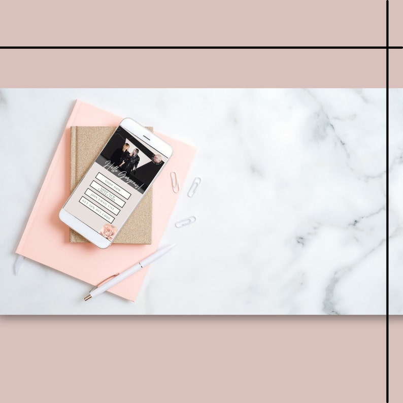 May include: A white smartphone with a pink and gold notebook and a white pen on a white marble surface. The phone screen displays a wedding website with the text "Hello Gorgeous!" and buttons for "RSVP", "Directions", "Dress Code", and "Gift Registry".