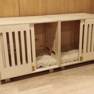 Modern dog crate with sliding door with a latch. Dog kennel, dog house, dog bed, indoor dog house, dog furniture, dog cage. Natural wood.