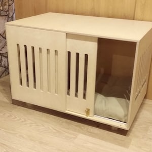 Modern dog crate with sliding door with a latch. Dog kennel, dog house, dog bed, indoor dog house, dog furniture, dog cage. Natural wood.