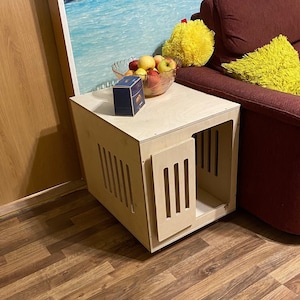 Modern dog crate with hinged door with a latch. Dog kennel, dog house, dog bed, indoor dog house, dog furniture, dog cage. Natural wood.