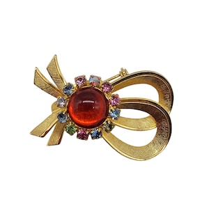 Vintage Gold-Tone Ribbon Brooch With Red Cabochon Colorful Rhinestones