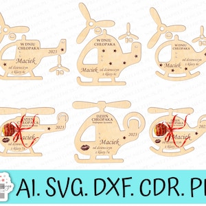 May include: Six wooden helicopter cutouts with the text "W DNIU CHŁOPAKA" and "Maciek" on them. The helicopters are decorated with stars and the year 2023. Some of the helicopters have a lollipop in the center.