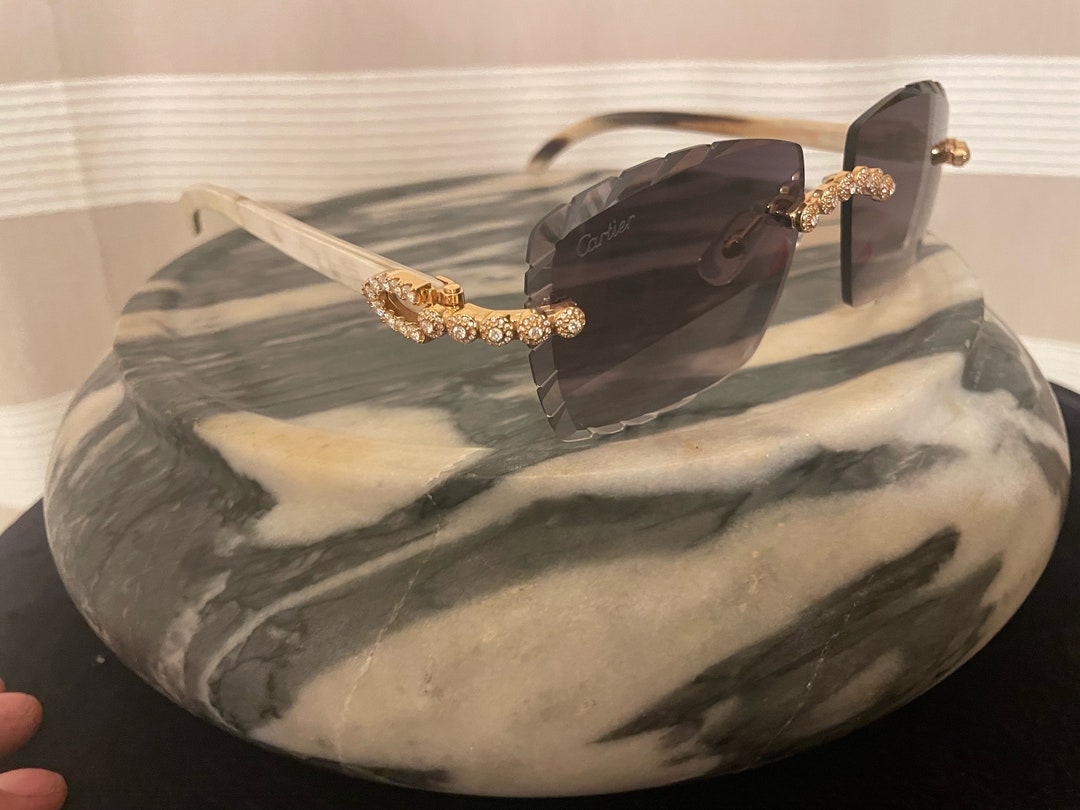 cartier glasses white buffs